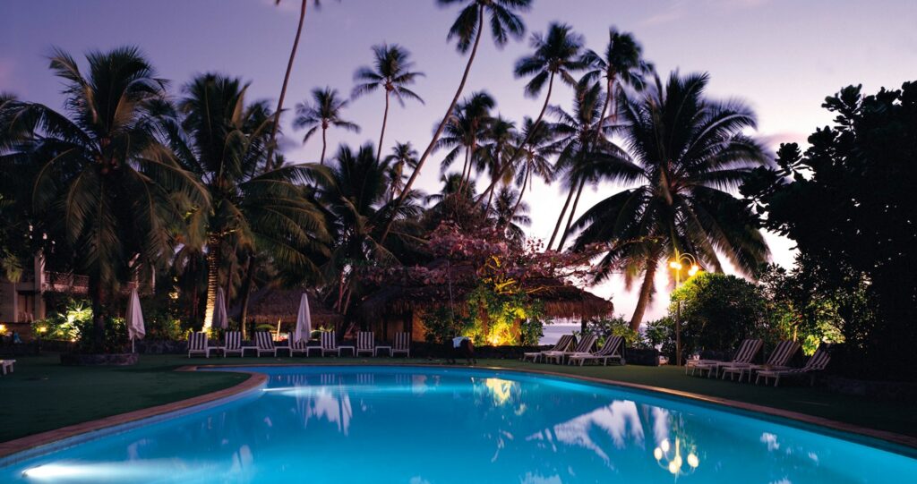 photo of swimming pool surrounded by trees